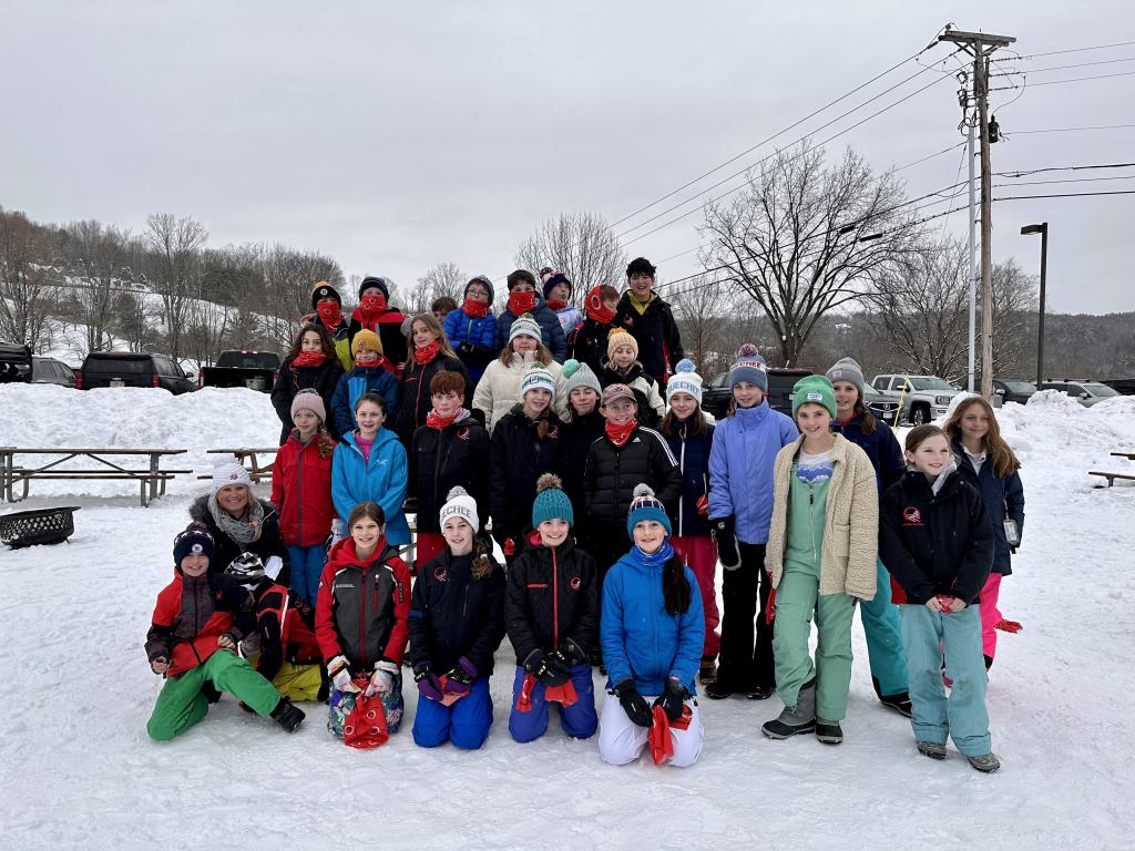 Quechee kids standing together posing for a picture
