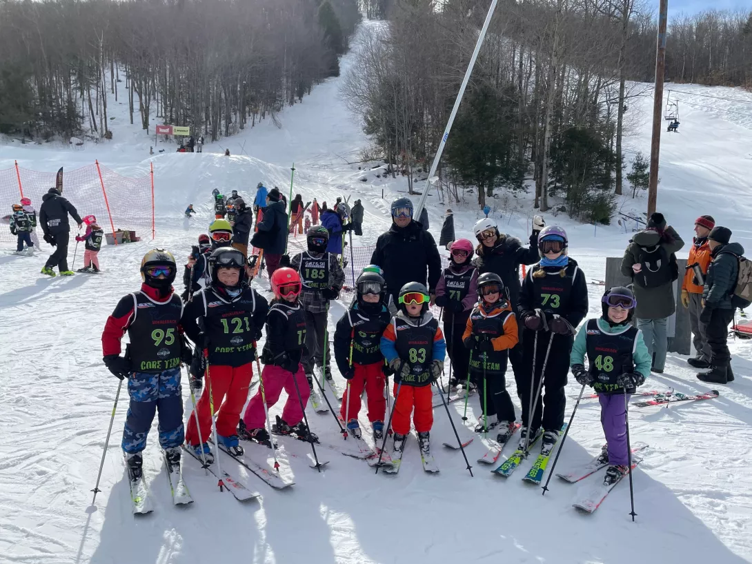 Picture of development team posing together on the mountain